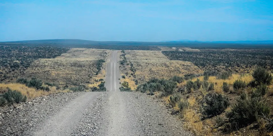 Gravel road through an open Idaho landscape